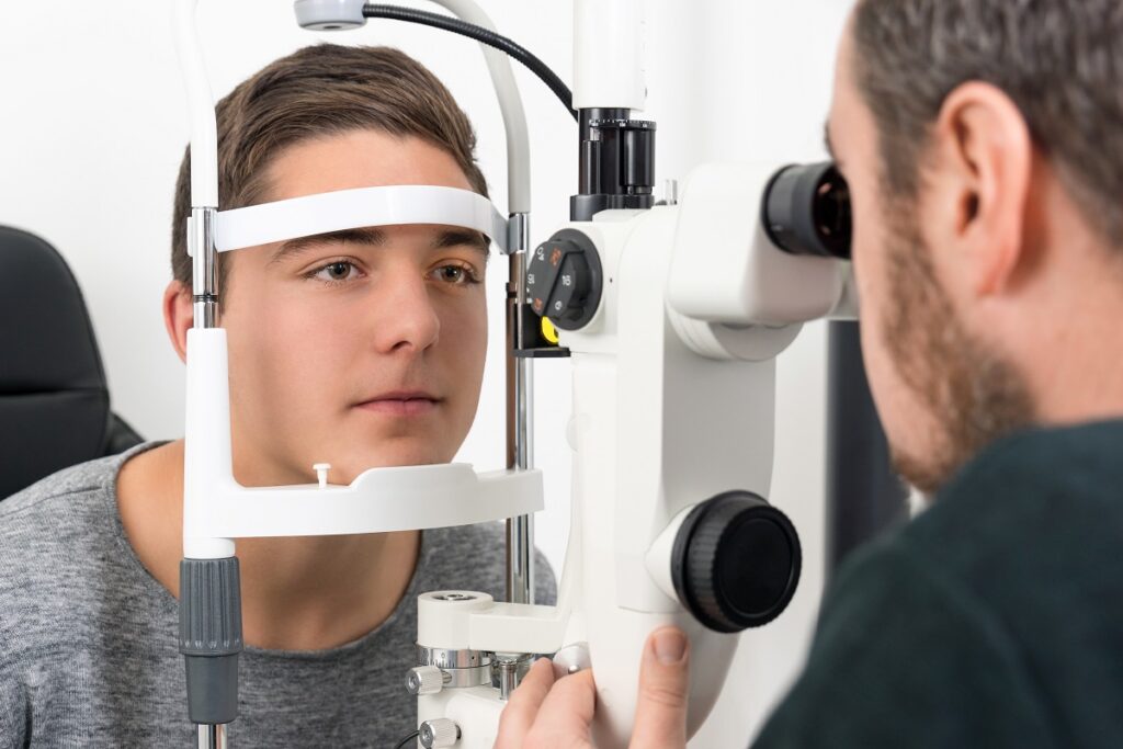 Young man having eye exam